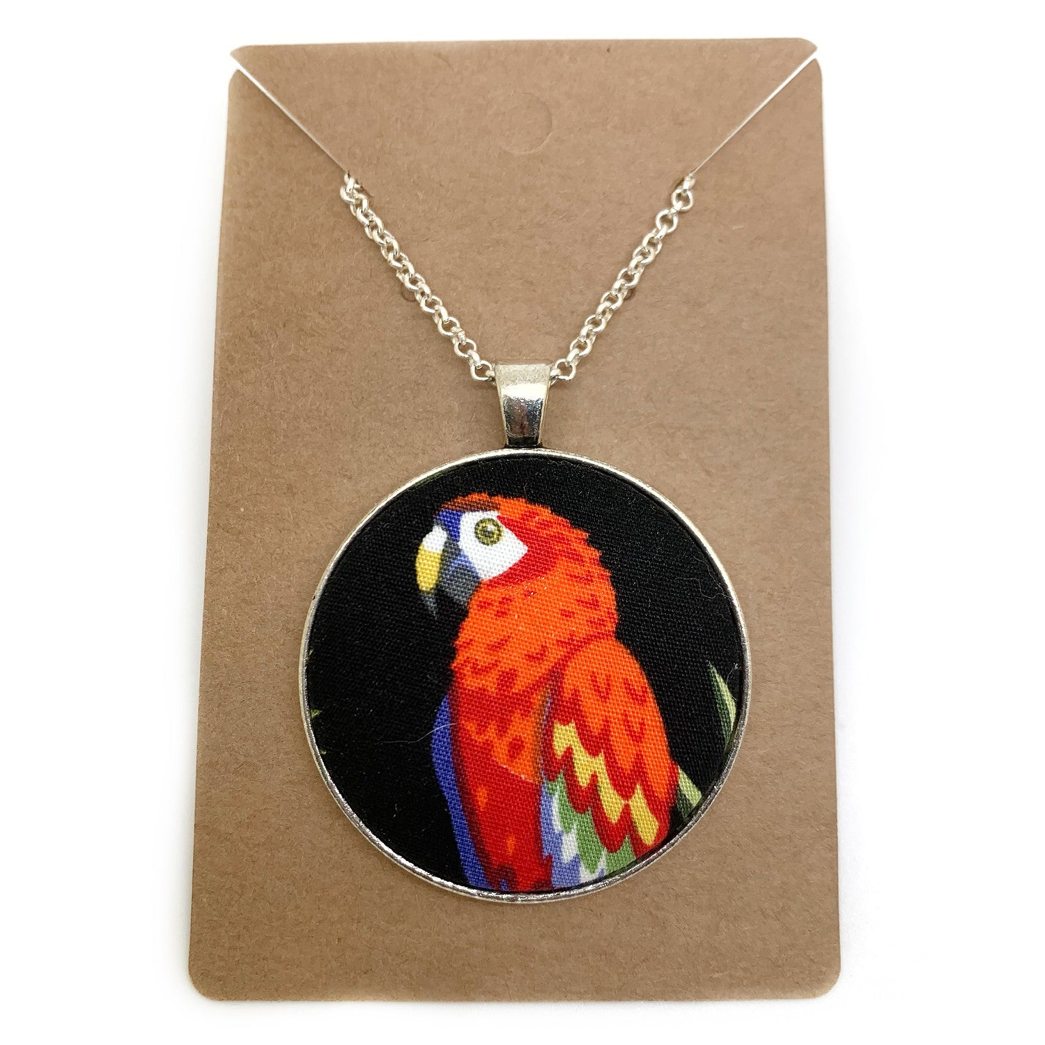 Parrot on black fabric button necklace — Rebel Aura handmade jewellery