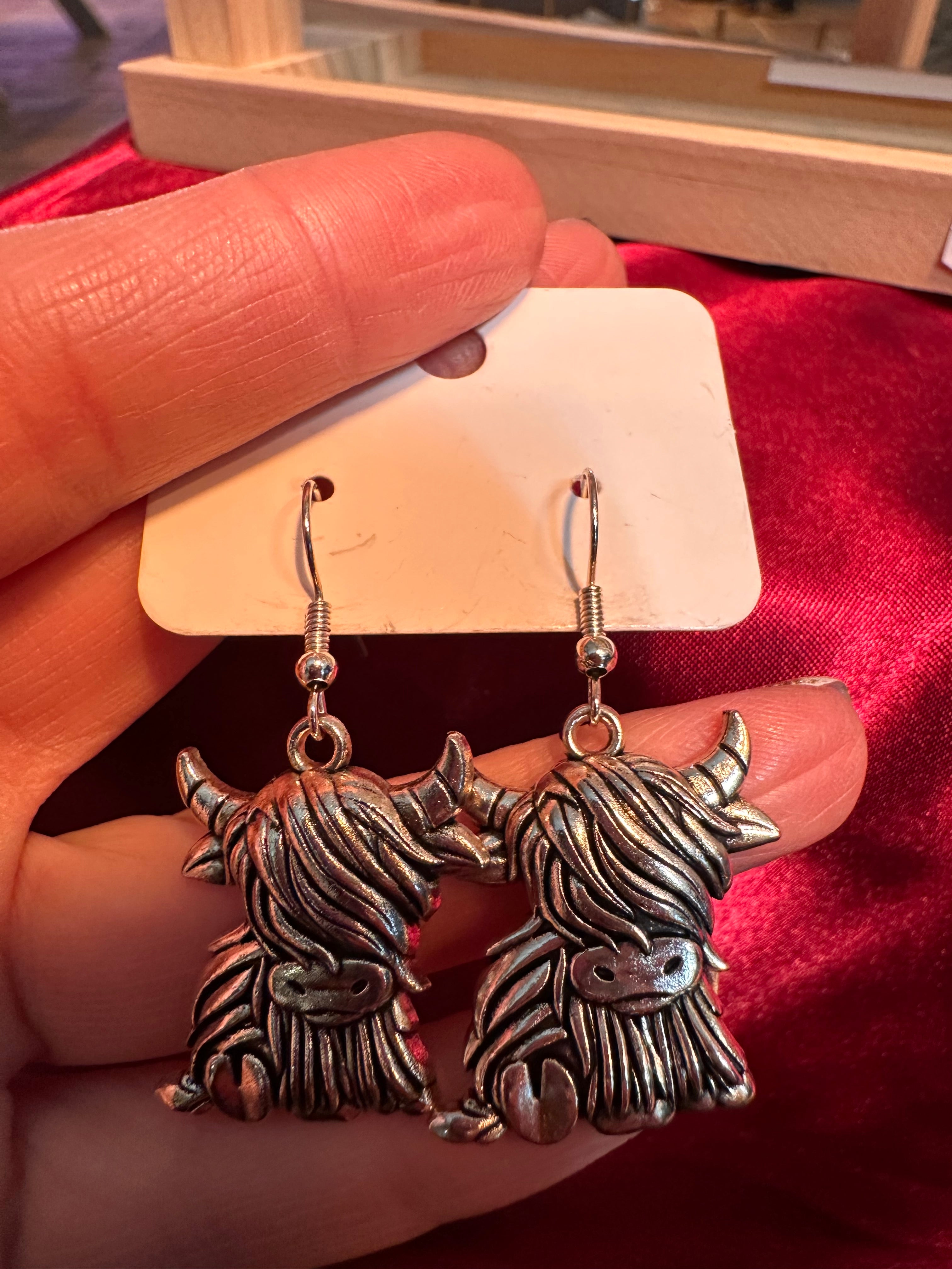 Silver highland cow charm earrings — Rebel Aura handmade jewellery