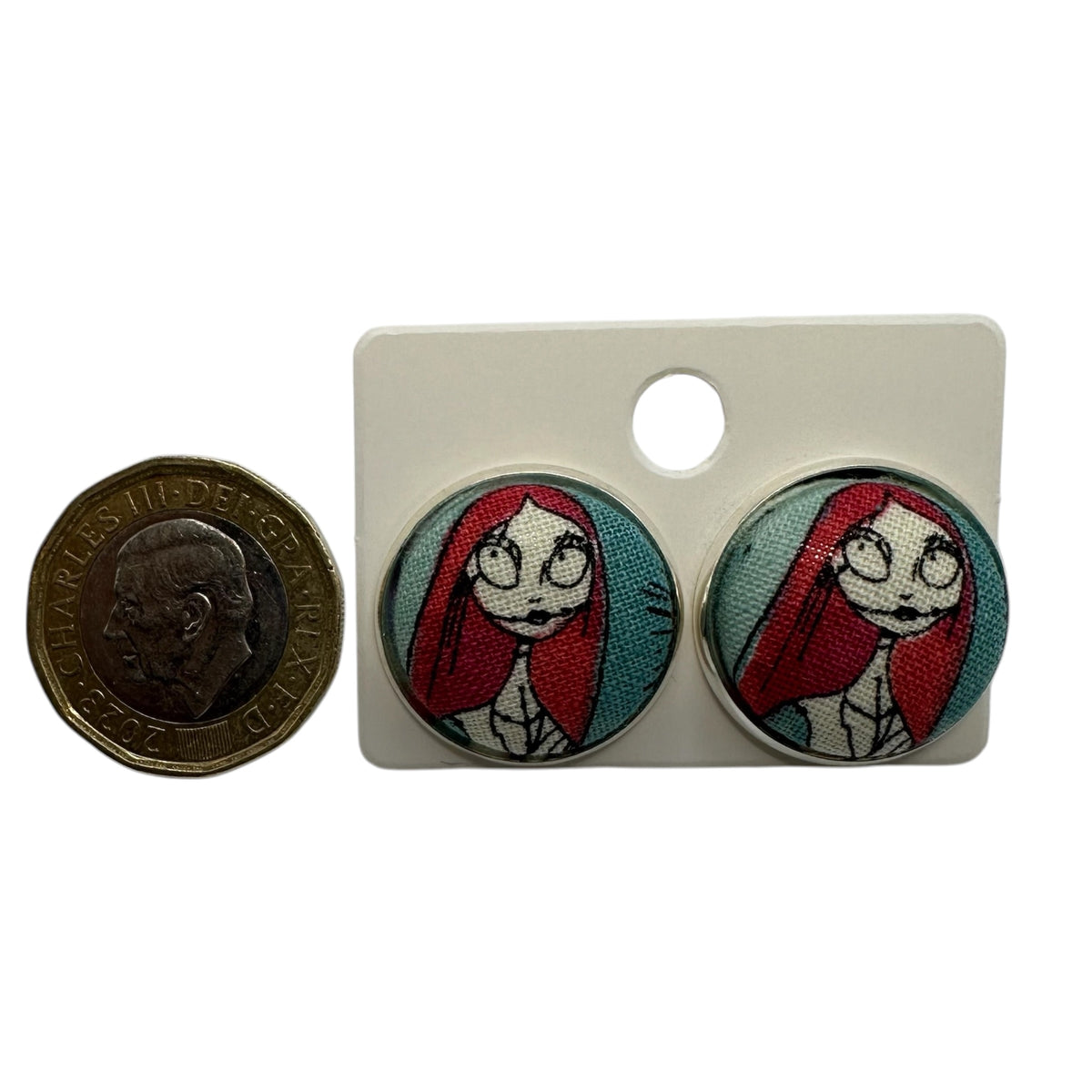 Close up of Jack Skellington stud earrings, Nightmare Before Christmas jewellery