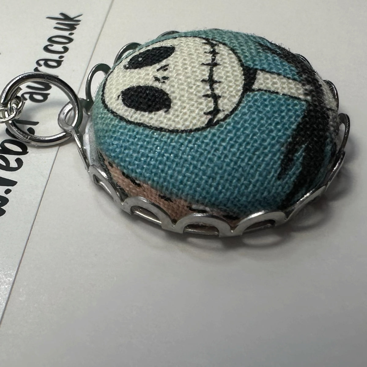 Nightmare Before Christmas Sally fabric button necklace on silver tone chain