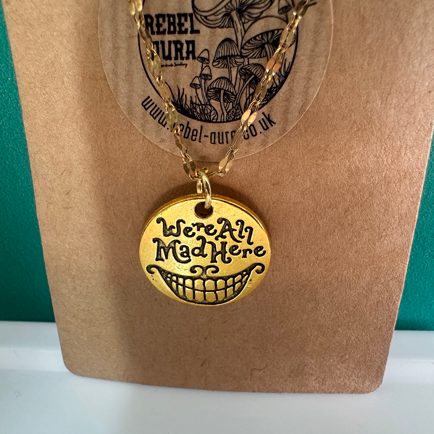 “We’re All Mad Here” Alice In Wonderland Gold Charm Necklace