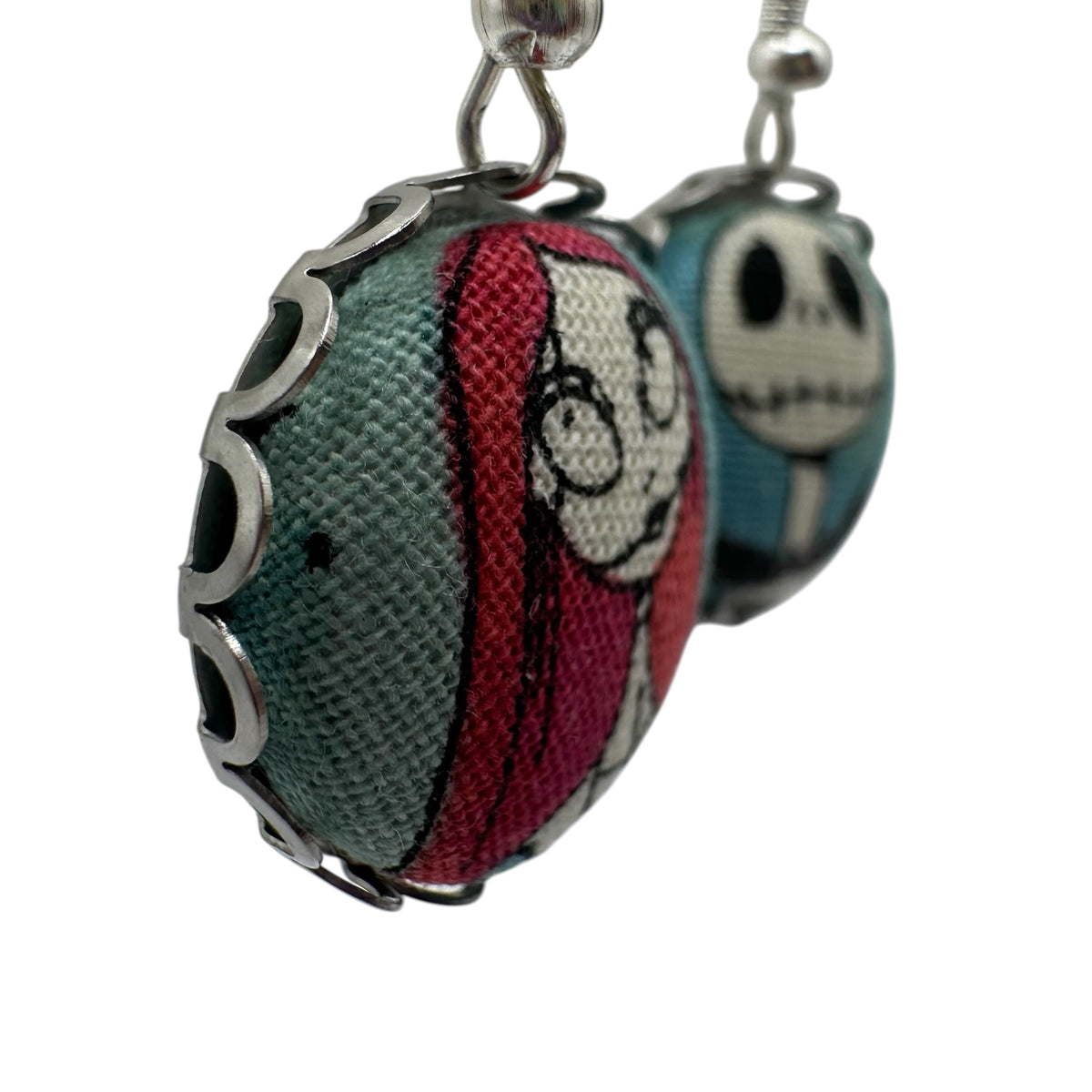 Sally fabric button drop earrings on display card